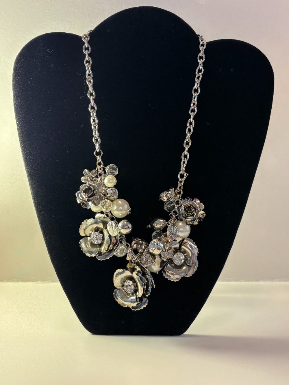 Silver Tone Metal Floral Charms, Crystals and Faux Pearls Statement Necklace